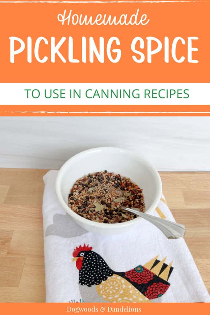 pickling spices in a bowl with a spoon sitting on a towel with a chicken with words "homemade pickling spice to use in canning recipes"