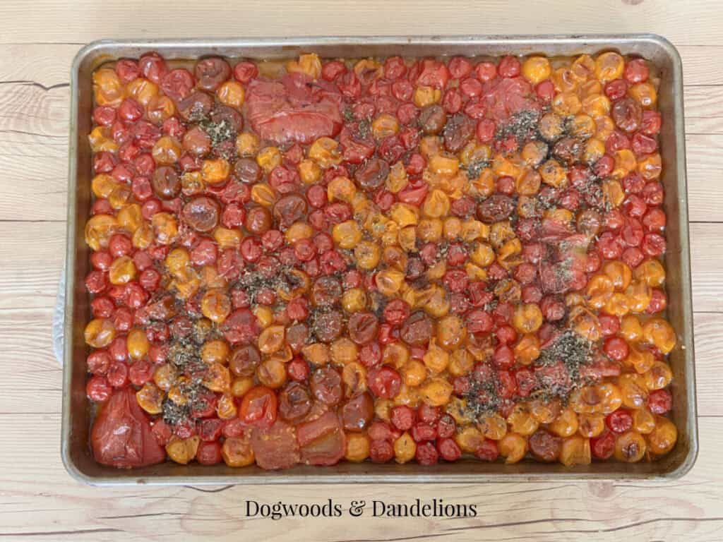 roasted cherry tomatoes on a sheet pan